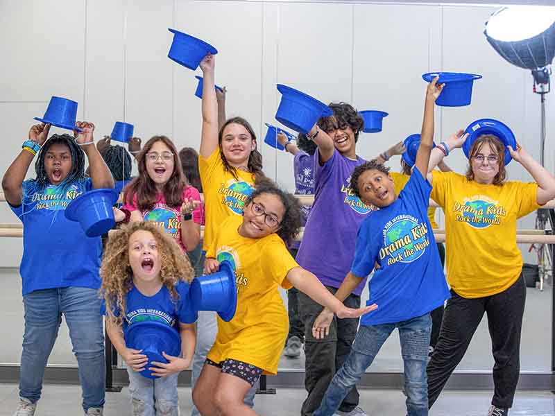 Group of Drama Kids students acting up Drama Camps were kids and teens learn and have fun