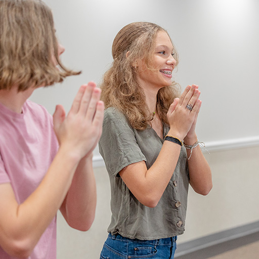Acting-Academy-two-young-ladies Drama Kids Acting Academy students clapping<br />